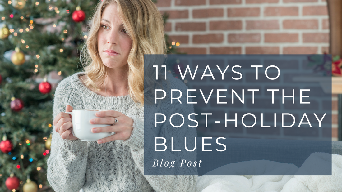 Photo of a sad woman sitting on a couch and holding a white cup. Christmas tree in the background. Caption reads 11 Ways to Prevent the Post-Holiday Blues - Blog Post
